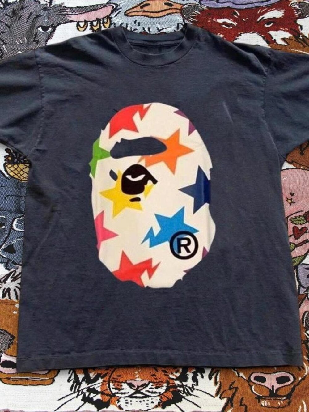 Black graphic tee with colorful design